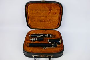 A Corton clarinet contained in fitted ca