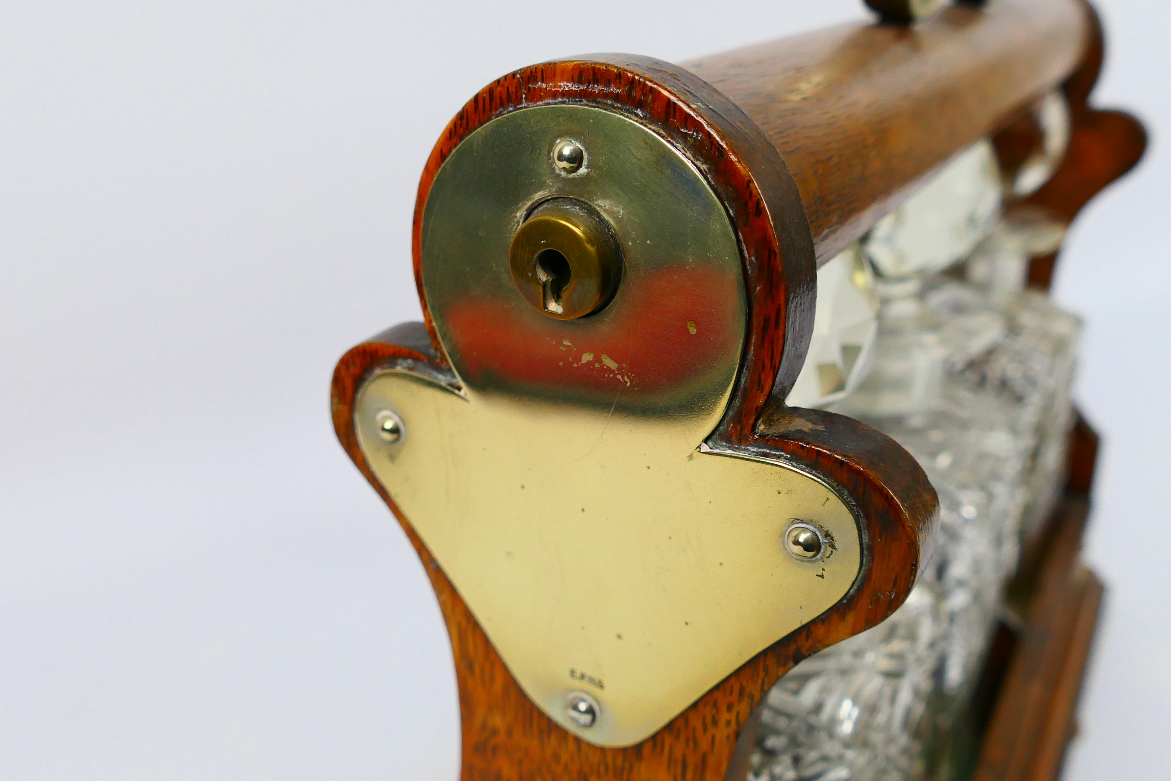 A three decanter oak tantalus with plated mounts, no maker's mark visible. - Image 6 of 6