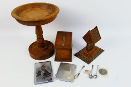 A mixed lot to include treen, a small silver knife, plated cigarette cases and other.