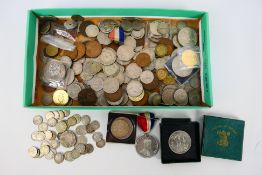 A collection of coins, commemorative cro