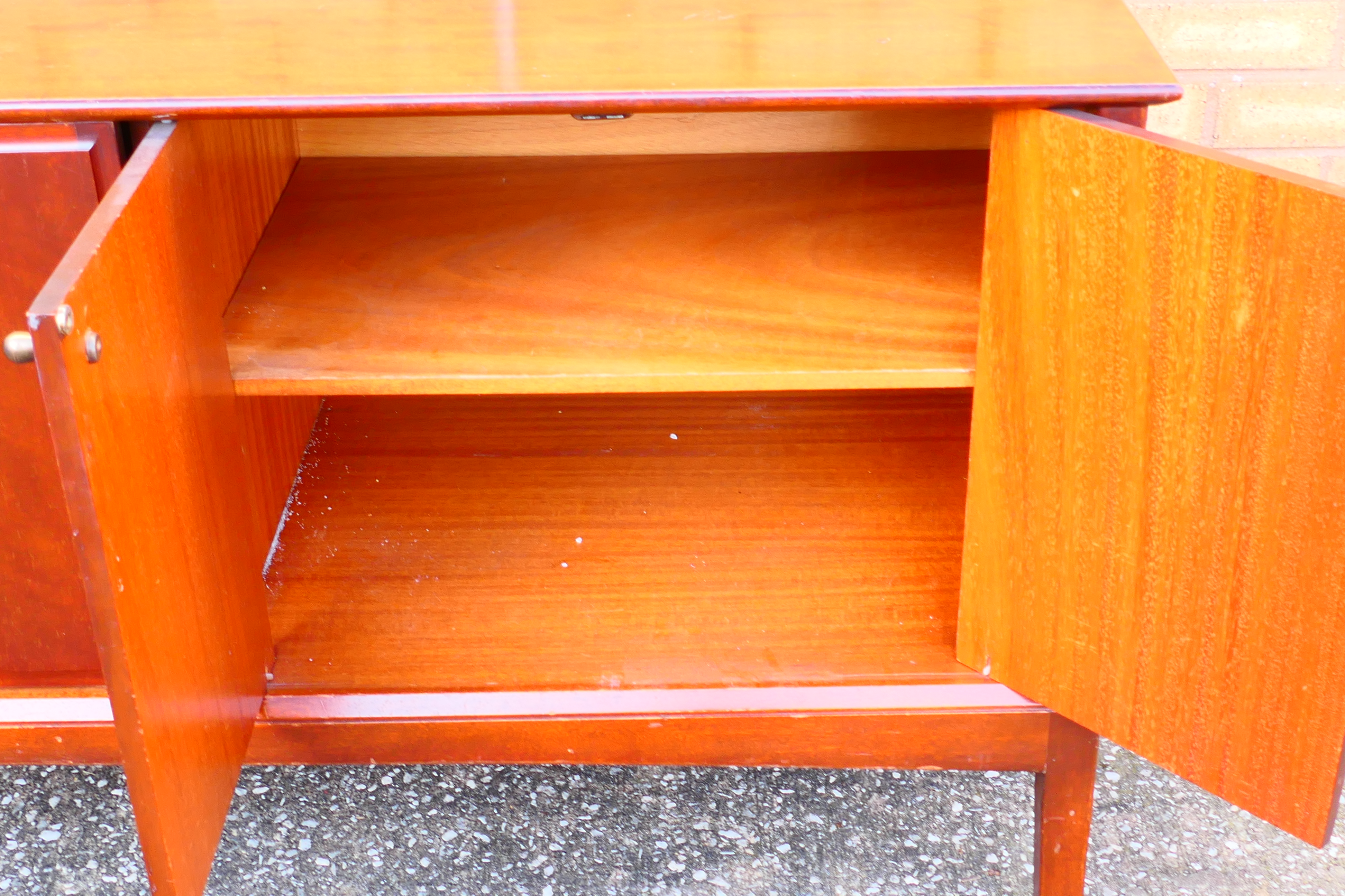 A Beithcraft Ltd sideboard having an arrangement of cupboards and three drawers, - Image 7 of 7