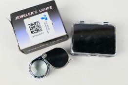 A jeweller's loupe, 30x magnification, new and unused, cased and in original box.