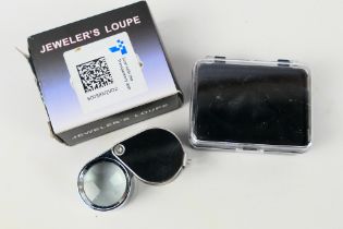 A jeweller's loupe, 30x magnification, new and unused, cased and in original box.