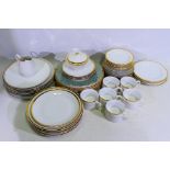 A quantity of Czechoslovakian dinner wares, white glaze with gilt rim, approximately 50 pieces.