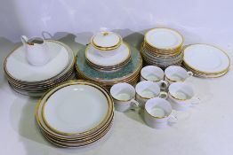 A quantity of Czechoslovakian dinner wares, white glaze with gilt rim, approximately 50 pieces.