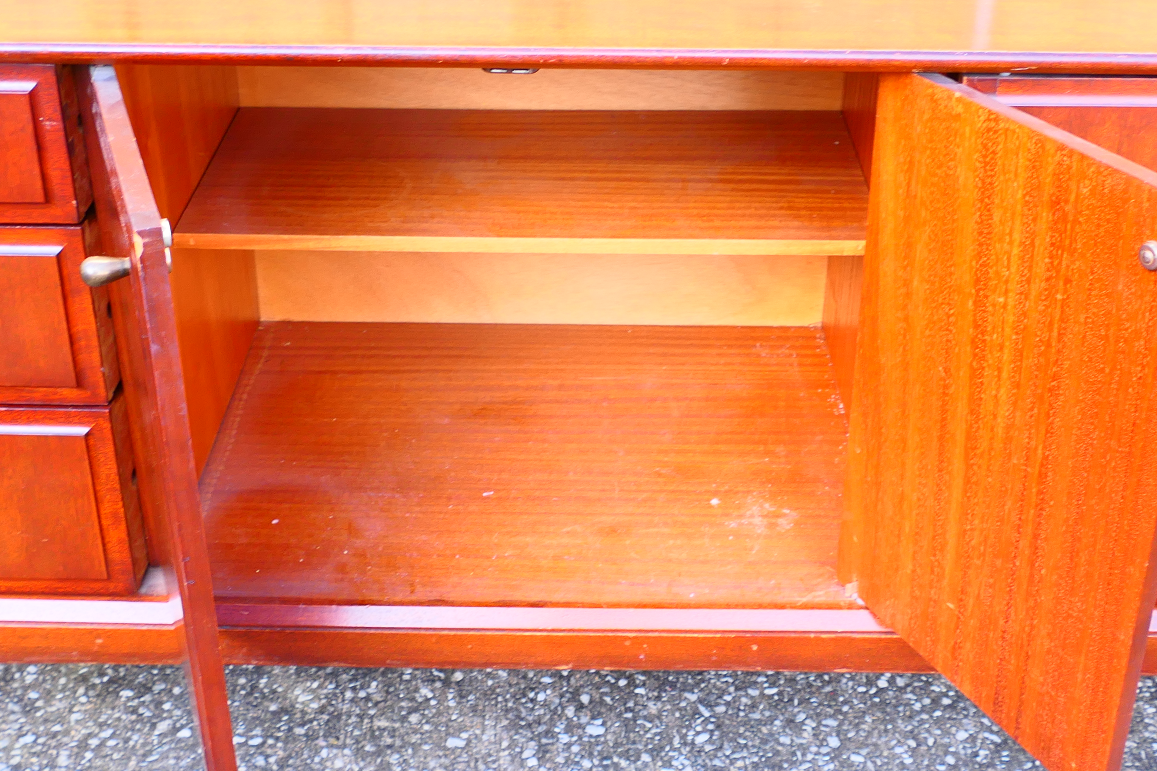 A Beithcraft Ltd sideboard having an arrangement of cupboards and three drawers, - Image 6 of 7