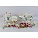 A small collection of coffee wares to include Aynsley and Royal Albert Old English Rose.