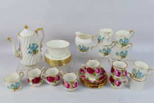 A small collection of coffee wares to include Aynsley and Royal Albert Old English Rose.