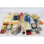 Lot to include costume jewellery, hand fans, powder compacts, dressing table items and other.