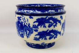 Royal Doulton - A large blue and white Chinoiserie jardiniere decorated in the Oyama pattern,