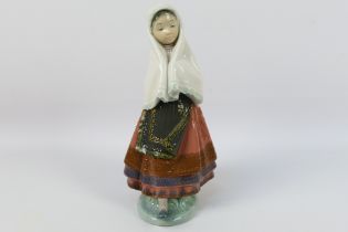 A Lladro figure, # 5053, Festival Time,