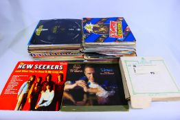 A collection of 12" and 10" vinyl record