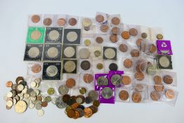 A collection of coins, predominantly UK,