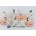 A collection of Nao figures, part boxed,