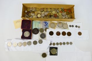 A collection of UK and foreign coins inc