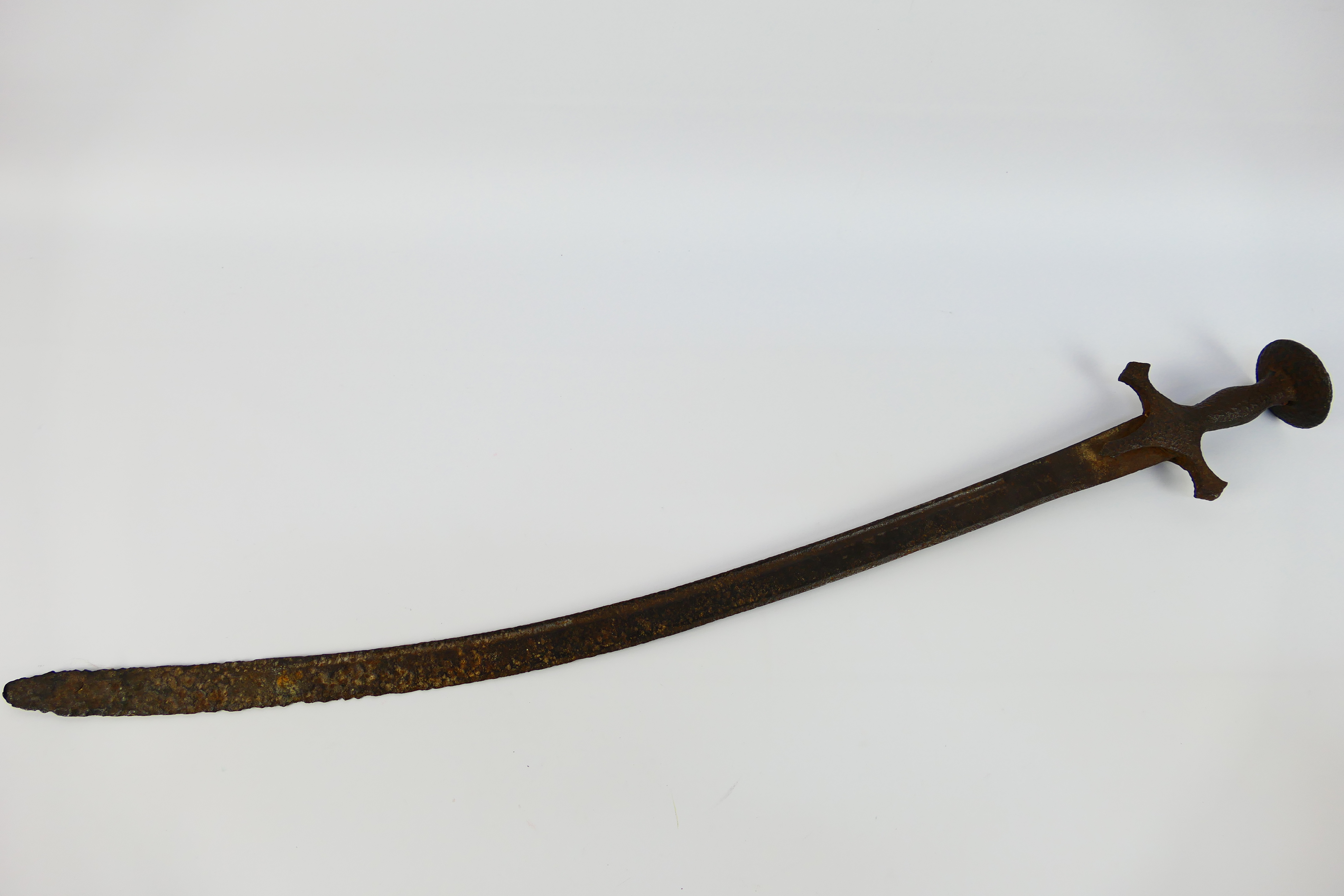 An talwar type sword, 71 cm (l) curved b