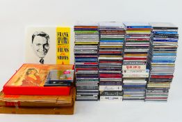 A large quantity of compact discs, predo