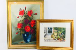 A framed oil on canvas floral still life