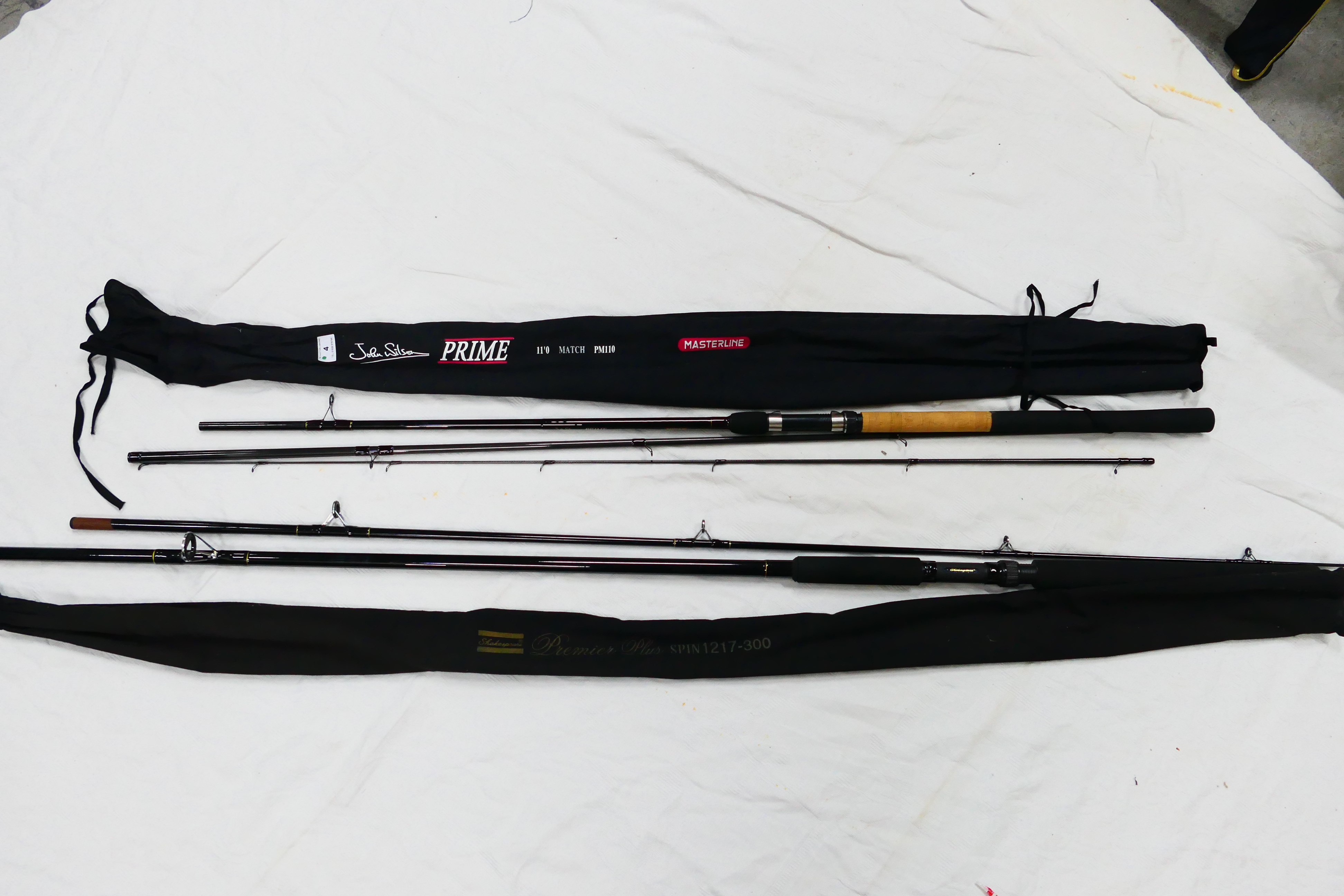 Two rods comprising a two piece John Wilson Prime 11' Match and a two piece Shakespeare Premiere