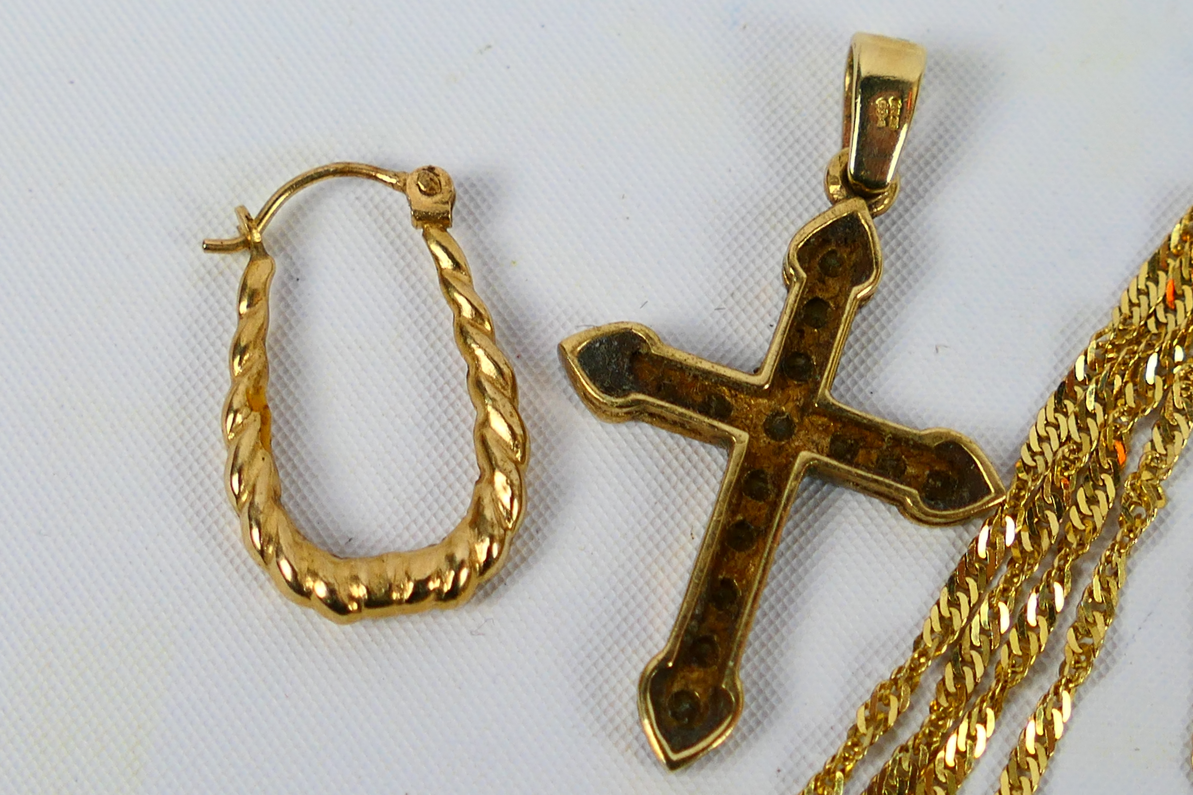 A 9ct gold stone set crucifix pendant, - Image 4 of 4