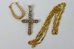 A 9ct gold stone set crucifix pendant,