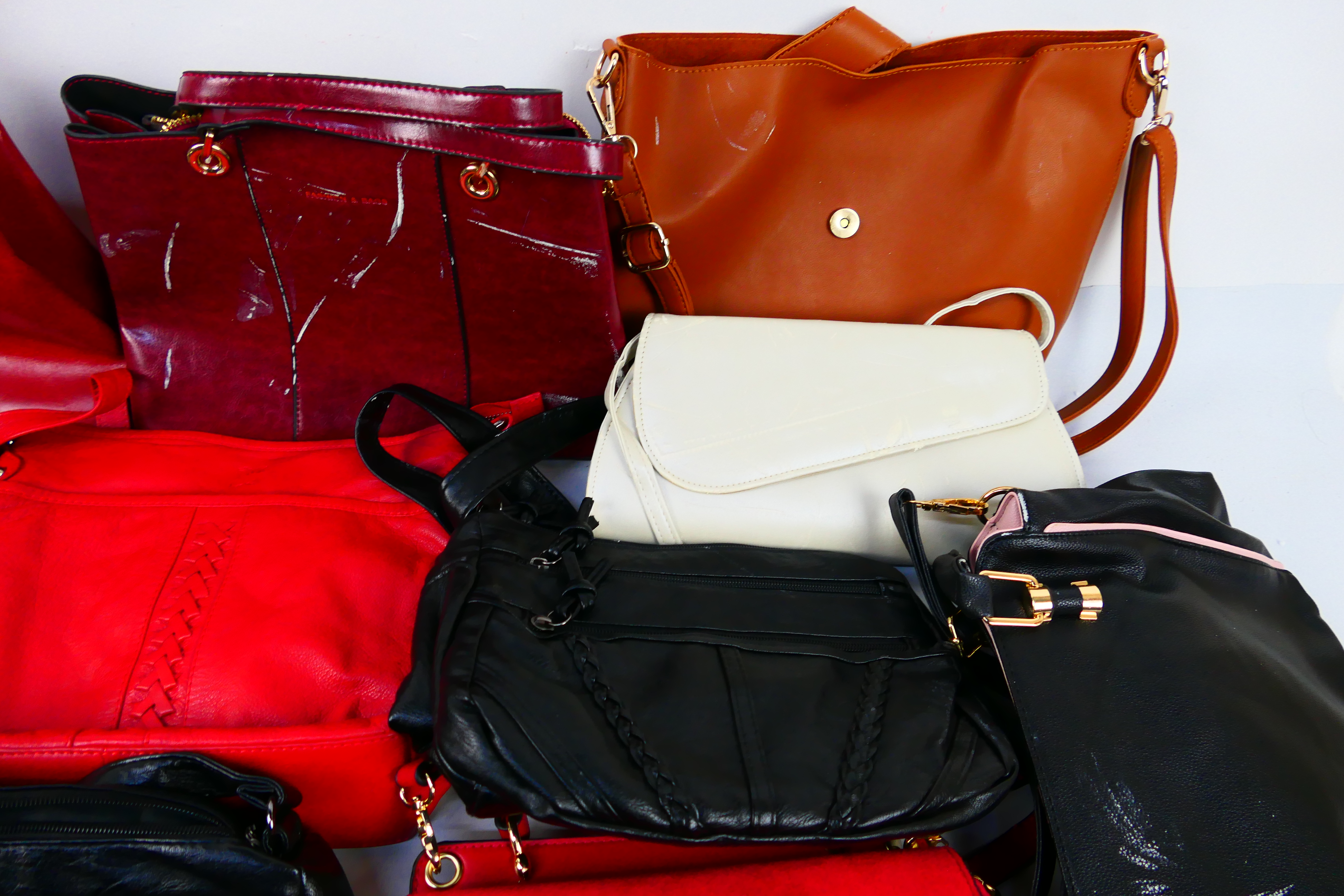 A job lot of predominantly unmarked handbags to include colours of dark blue, dark red, black, - Image 6 of 6