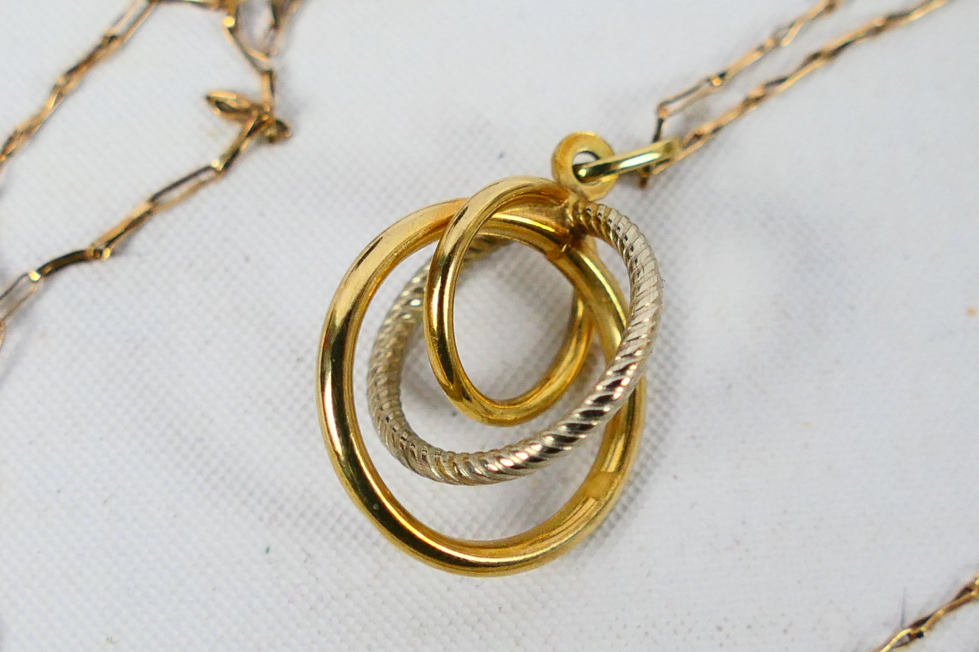 A 9ct yellow gold necklace, 56 cm (l), with pendant stamped 375, approximately 1.7 grams. - Image 4 of 4