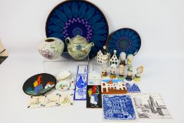 Mixed ceramics to include tiles, vase, a collection of small busts,