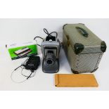Lot to include a vintage Sony Walkman, boxed Stylophone and vintage projector in carry case.