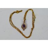 A rose metal pendant set with amethyst with chain stamped 14k, 40 cm (l), approximately 2.