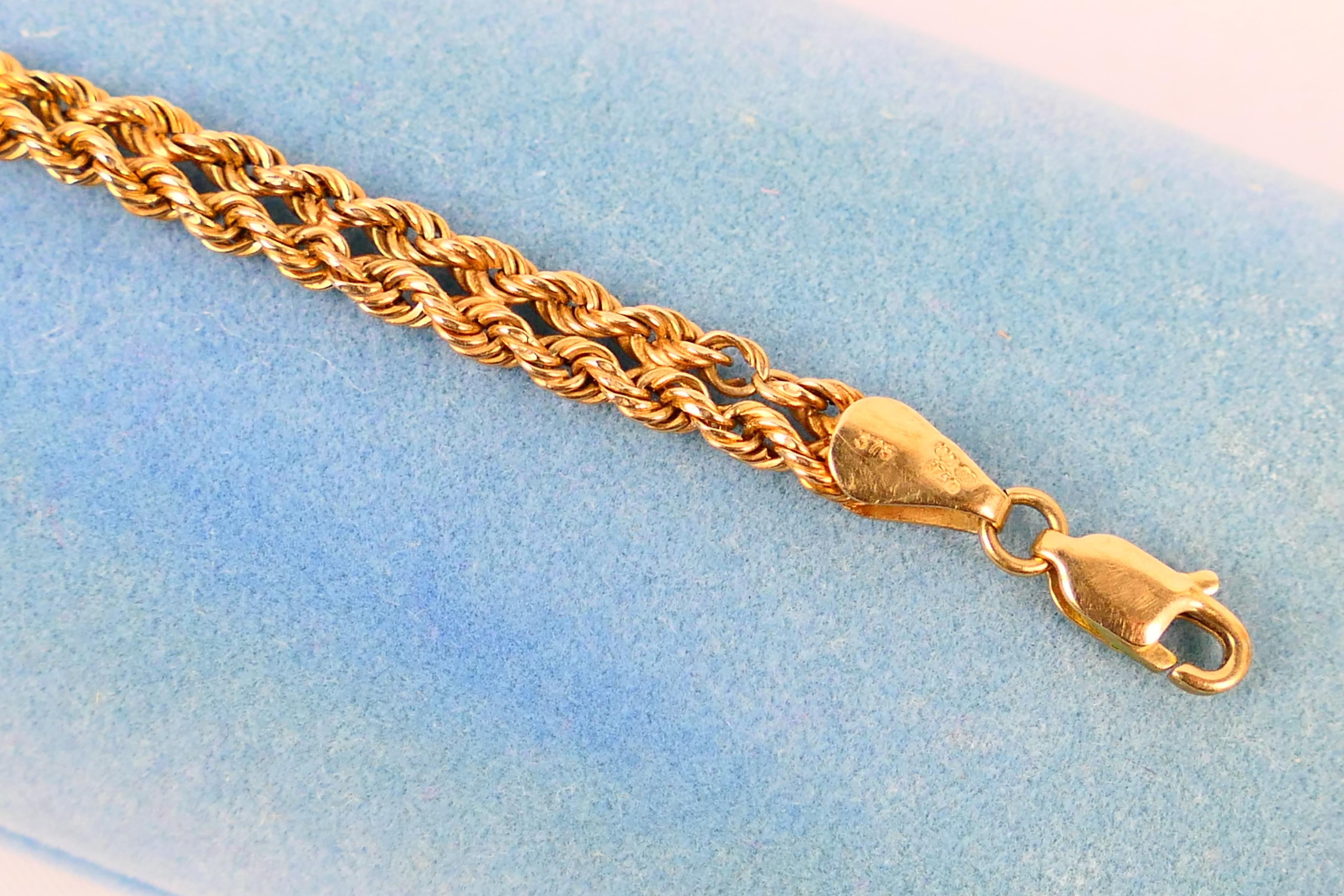 A 9ct yellow gold rope twist bracelet, 19 cm (l), approximately 3 grams. - Image 3 of 4