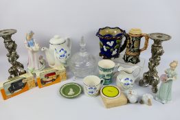 A mixed lot comprising ceramics to include Nao, Royal Doulton and similar, candlesticks and other.