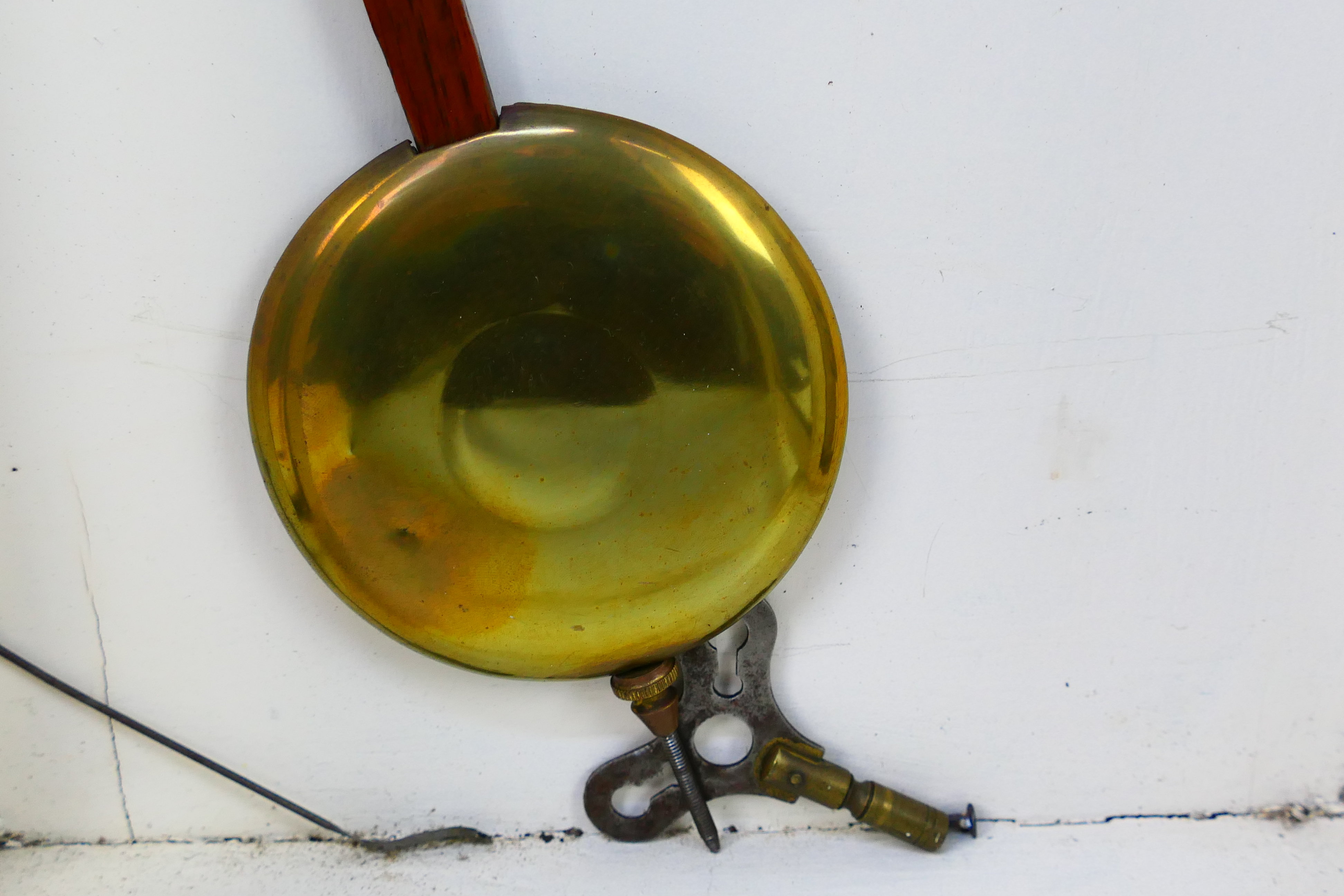 A white painted wall clock, Roman numerals to a white dial, with key and pendulum. - Image 6 of 8