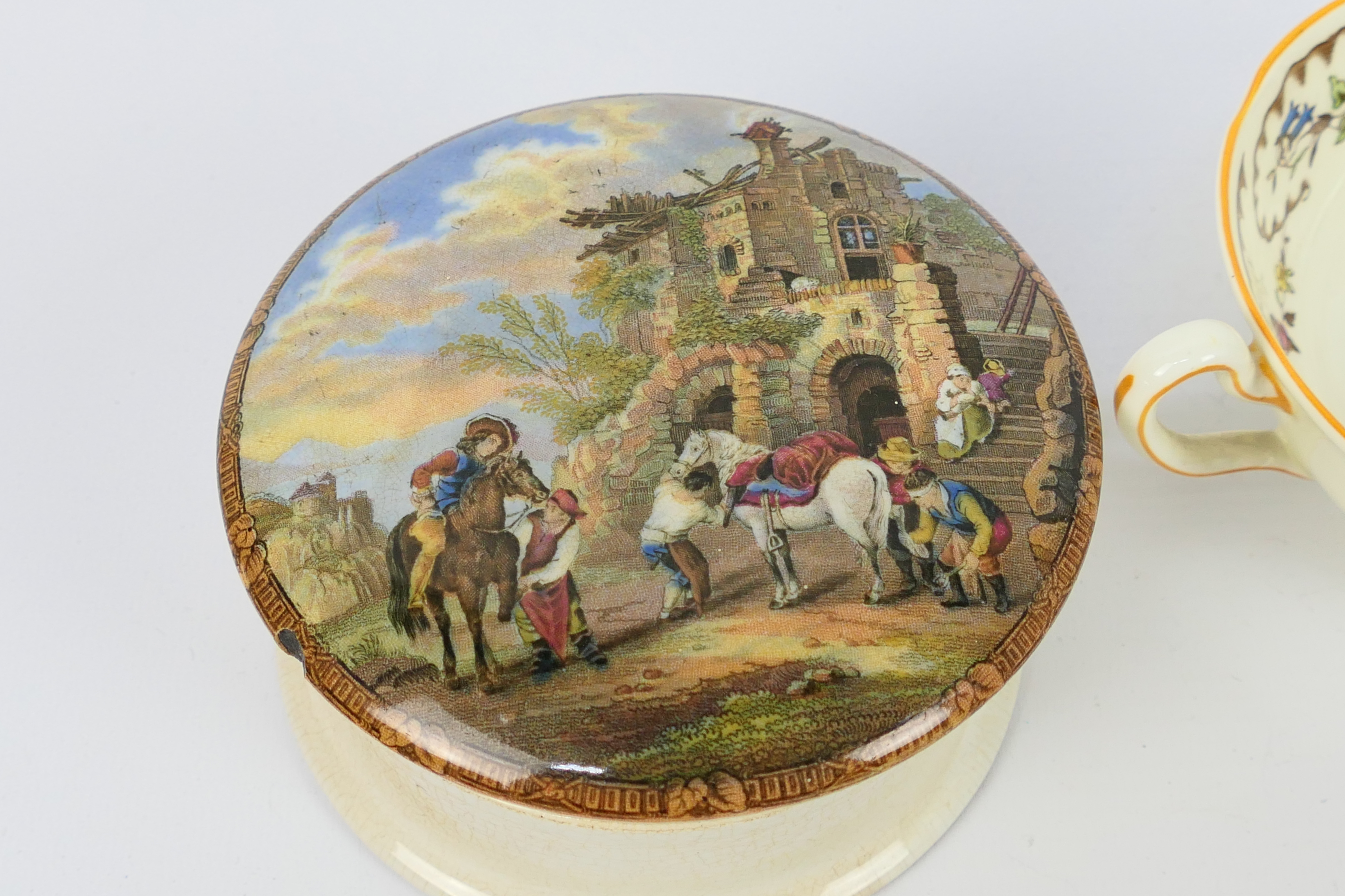 A 19th century Prattware paste pot The Travellers Rest and two soup bowls and saucers, - Image 2 of 6