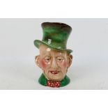 A large Beswick character jug, # 310, Mr Micawber, approximately 23 cm (h).