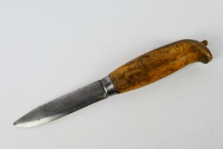 A Scandinavian Puukko type knife, 9.5 cm (l) blade.