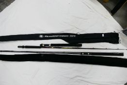 Two rods comprising a two piece Penn Powergraph Powerstick 30 - 50lb line and a two piece Grauvell