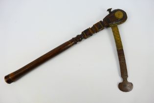 Ethnographica - An African ceremonial axe with brass mounts, approximately 43 cm (l) haft.