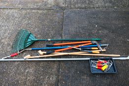 A quantity of various garden tools.