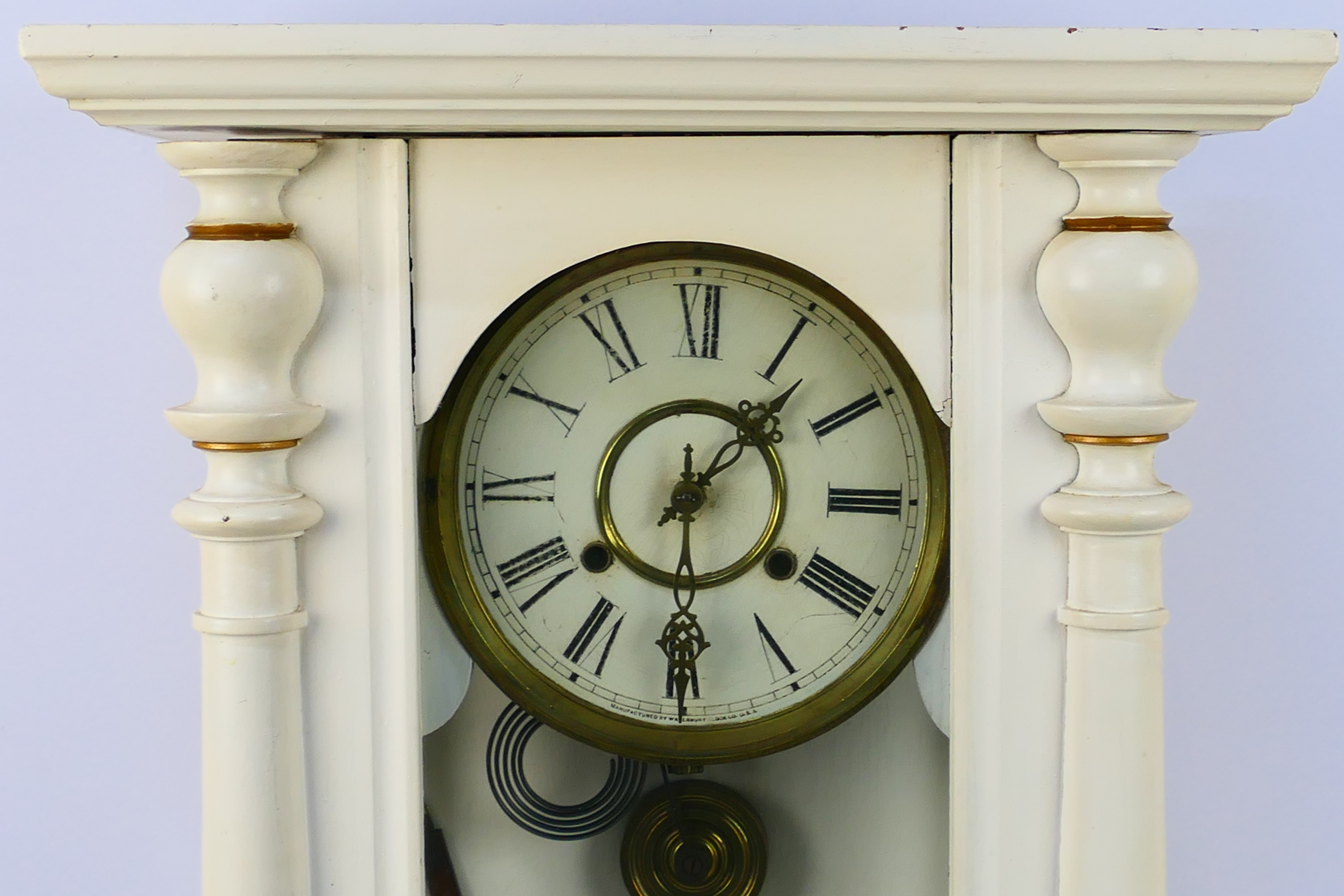 A white painted wall clock, Roman numerals to a white dial, with key and pendulum. - Image 2 of 8