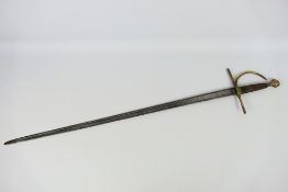 An antique infantry sword with 82 cm (l) blade, brass crossguard and D shaped knuckle bow,