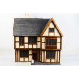 Manorcraft - A Doll's House hand crafted by Gerry Welch of Manorcraft in Barnstaple Devon depicting