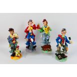 A set of four Regency Fine Arts clown figures, approximately 26 cm (h).