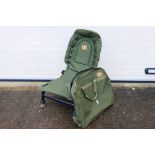 A Carp Kinetics folding fishing chair contained in carry case.