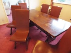 A refectory dining table and six dining chairs with brown leather upholstery,