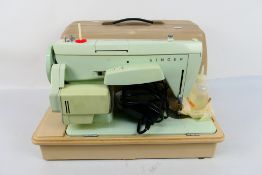 A vintage Singer 258 electric sewing machine.