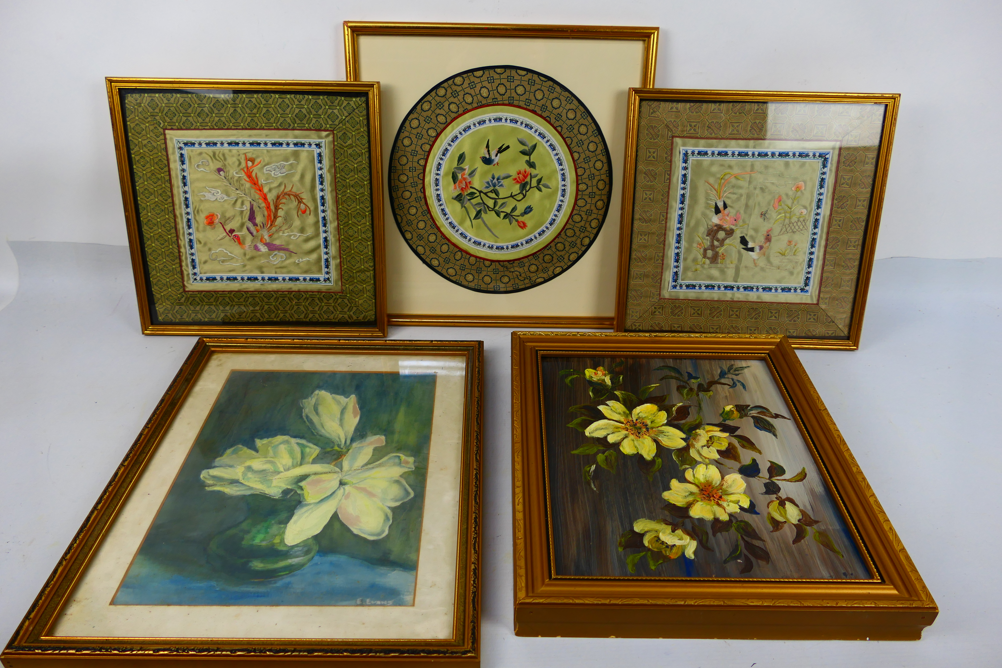 Three framed Chinese embroideries on silk, framed under glass,