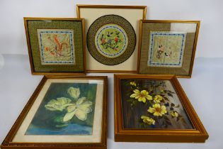 Three framed Chinese embroideries on silk, framed under glass,