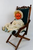 DTD - A vintage talking doll marked DTD made in Japan and 24 inches tall.