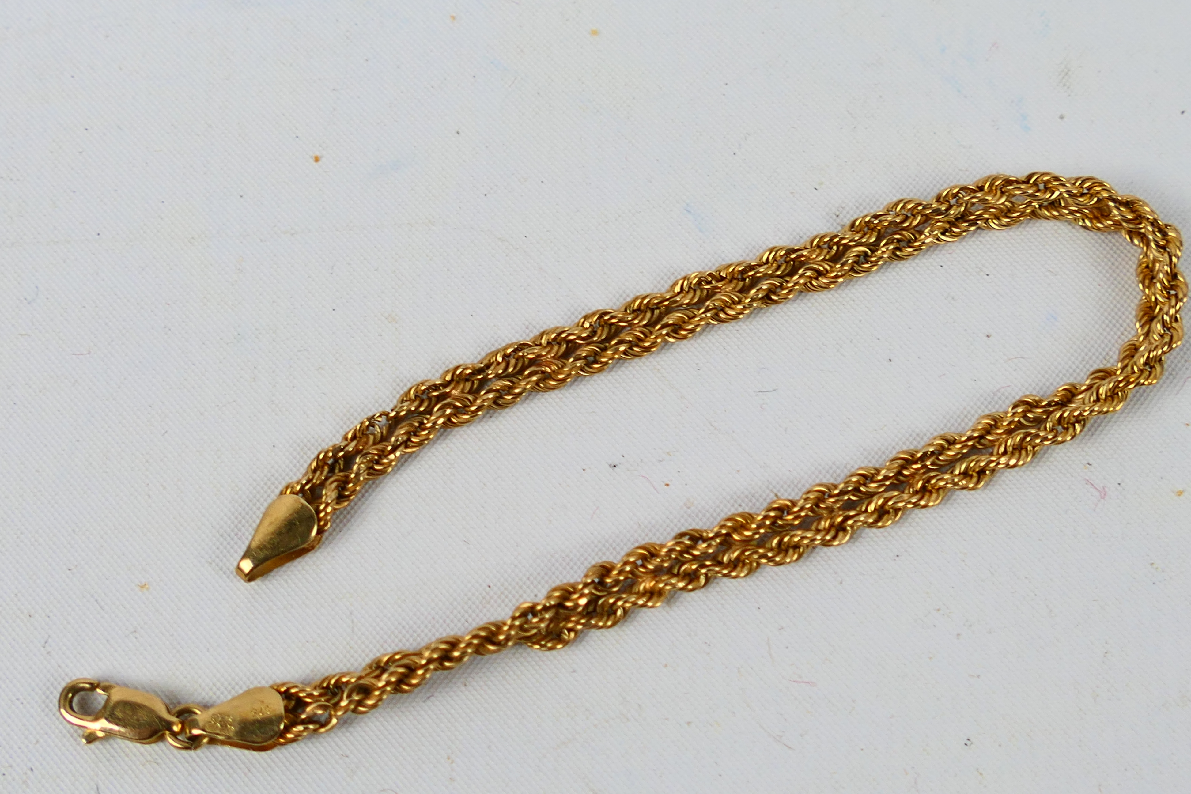 A 9ct yellow gold rope twist bracelet, 19 cm (l), approximately 3 grams. - Image 4 of 4